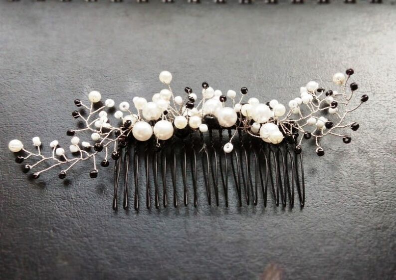 comb with pearls as a lucky charm