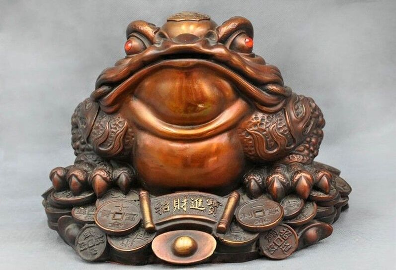 silver toad amulet