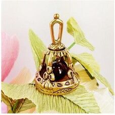 It is best to buy an amulet in the form of a bell during the growing moon. 